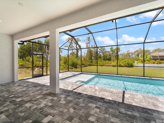 223 Australian Dr, Rotonda West, FL 33947 - outdoor pool with a patio and glass enclosure