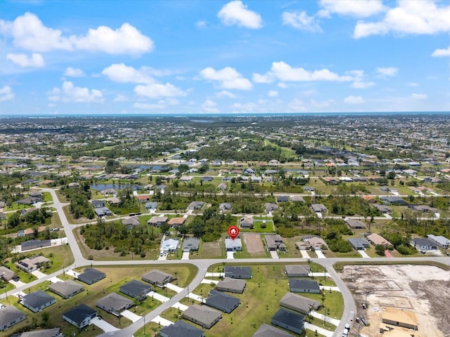 223 Australian Dr, Rotonda West, FL 33947 - aerial overview of property's location featuring nearby suburban area