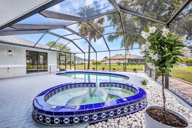 2442 Rio De Janeiro Ave, Punta Gorda, FL 33983 - view of pool featuring a pool with connected hot tub and glass enclosure