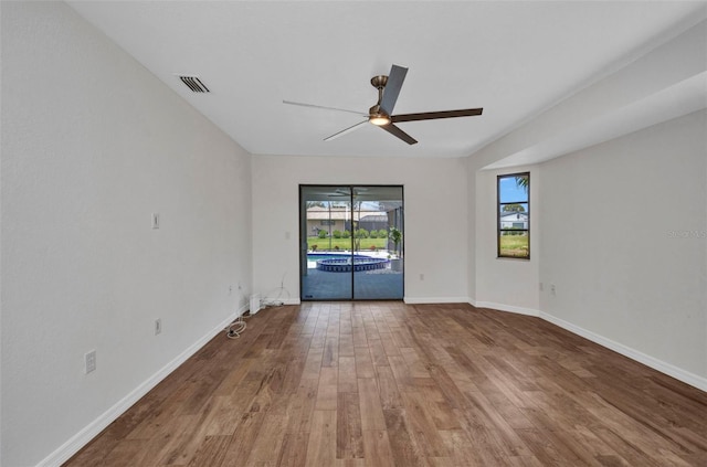 2442 Rio De Janeiro Ave, Punta Gorda, FL 33983 - unfurnished room with a ceiling fan, wood finished floors, and baseboards