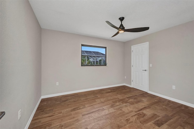 2442 Rio De Janeiro Ave, Punta Gorda, FL 33983 - unfurnished room with ceiling fan, baseboards, and wood finished floors
