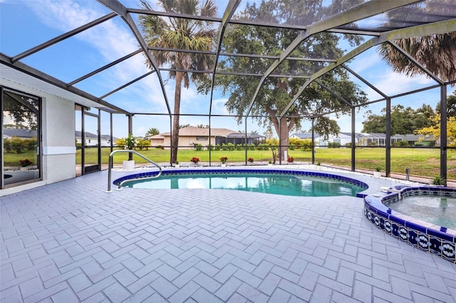 2442 Rio De Janeiro Ave, Punta Gorda, FL 33983 - view of pool with a patio, a yard, a lanai, and a pool with connected hot tub