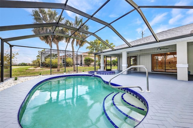 2442 Rio De Janeiro Ave, Punta Gorda, FL 33983 - view of swimming pool featuring a patio, a lanai, and a pool with connected hot tub