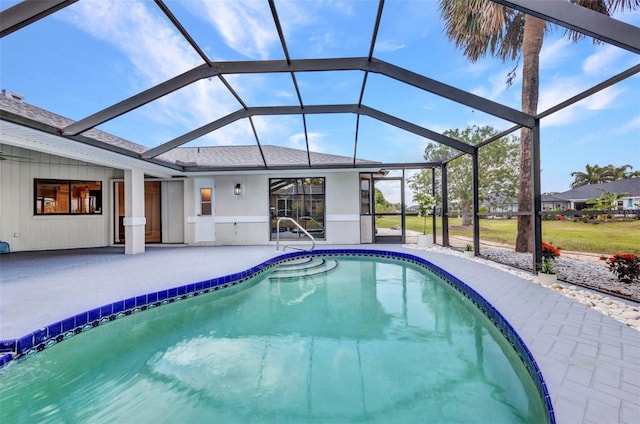 2442 Rio De Janeiro Ave, Punta Gorda, FL 33983 - swimming pool featuring a patio area and glass enclosure