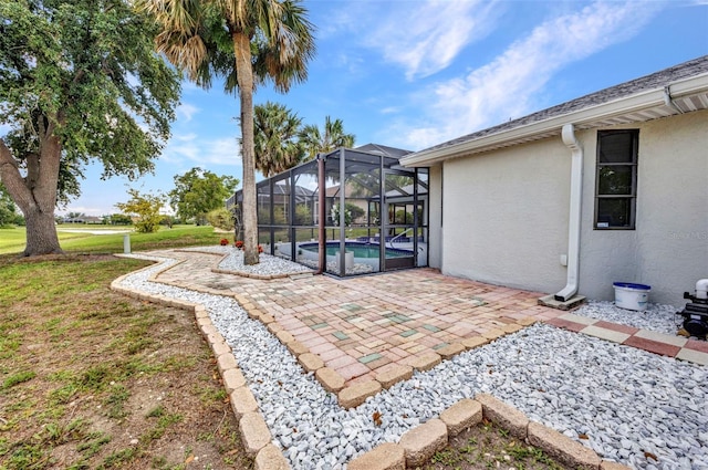 2442 Rio De Janeiro Ave, Punta Gorda, FL 33983 - view of patio with an outdoor pool and glass enclosure