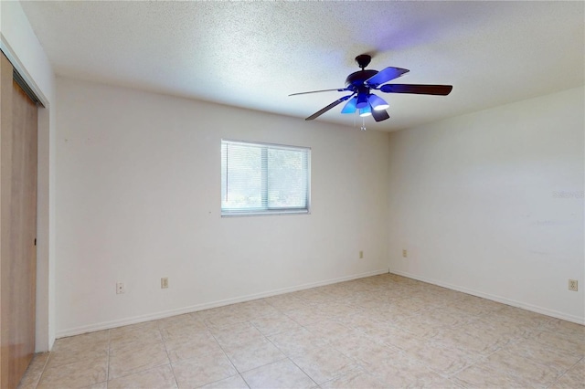 4071 Dekle Ave, North Port, FL 34286 - unfurnished bedroom with a closet, a ceiling fan, and a textured ceiling