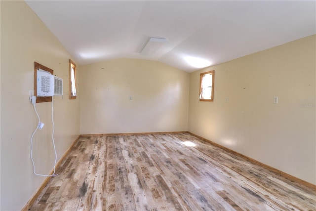 4071 Dekle Ave, North Port, FL 34286 - basement with wood finished floors and a wall unit AC