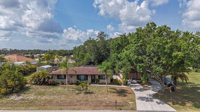 4071 Dekle Ave, North Port, FL 34286 - ranch-style house featuring concrete driveway
