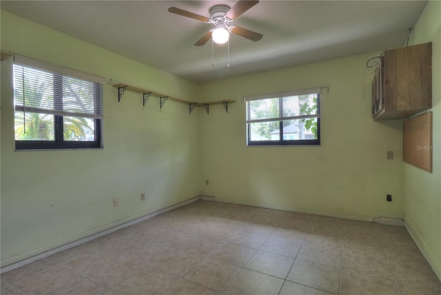 4071 Dekle Ave, North Port, FL 34286 - empty room featuring light tile patterned flooring and ceiling fan