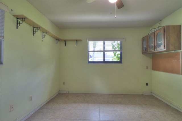 4071 Dekle Ave, North Port, FL 34286 - empty room featuring a ceiling fan and light tile patterned floors