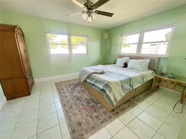 3122 Scranton St, Port Charlotte, FL 33952 - bedroom featuring light tile patterned flooring, baseboards, and ceiling fan