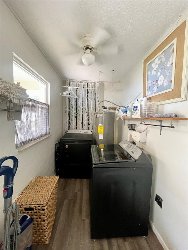3122 Scranton St, Port Charlotte, FL 33952 - washroom with electric water heater, washer and dryer, wood finished floors, and a textured ceiling