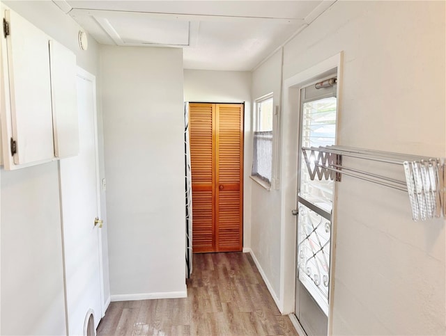 3122 Scranton St, Port Charlotte, FL 33952 - hallway featuring light wood-style flooring and baseboards