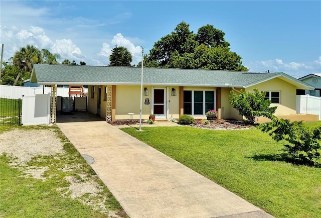 3122 Scranton St, Port Charlotte, FL 33952 - ranch-style home with driveway, a carport, stucco siding, and a shingled roof