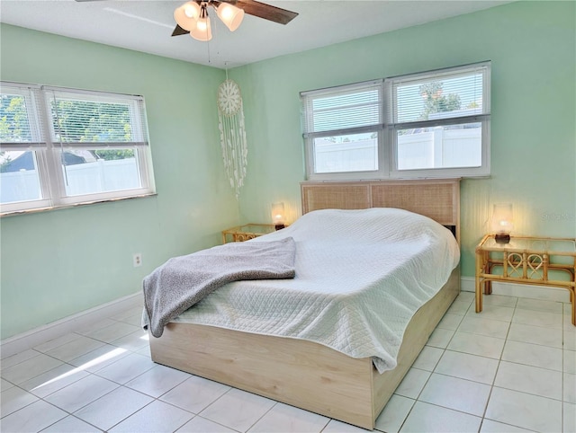 3122 Scranton St, Port Charlotte, FL 33952 - tiled bedroom with baseboards and ceiling fan