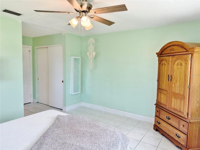 3122 Scranton St, Port Charlotte, FL 33952 - unfurnished bedroom featuring light tile patterned flooring, a closet, and ceiling fan
