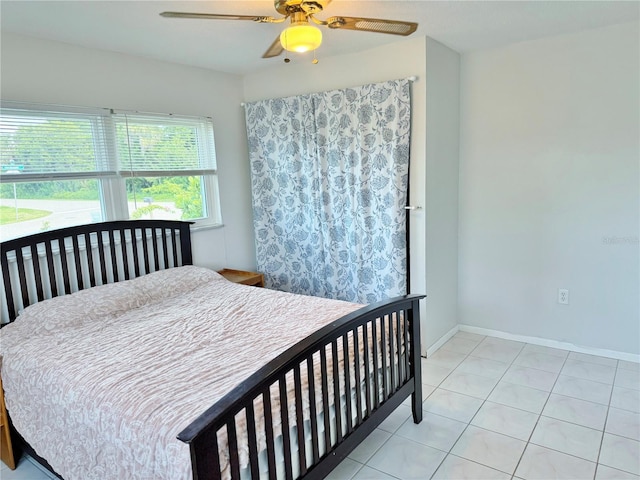 3122 Scranton St, Port Charlotte, FL 33952 - bedroom featuring light tile patterned floors and a ceiling fan