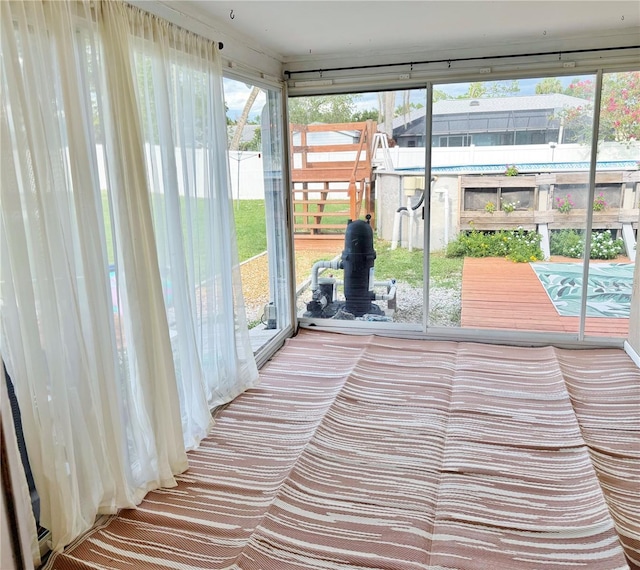3122 Scranton St, Port Charlotte, FL 33952 - unfurnished sunroom featuring plenty of natural light