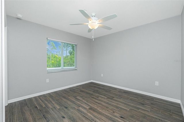 5532 Veracruz Ter, Port Charlotte, FL 33981 - empty room featuring dark wood-style floors, a ceiling fan, and baseboards