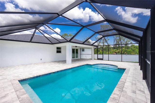 5532 Veracruz Ter, Port Charlotte, FL 33981 - swimming pool with a patio area, a ceiling fan, and glass enclosure