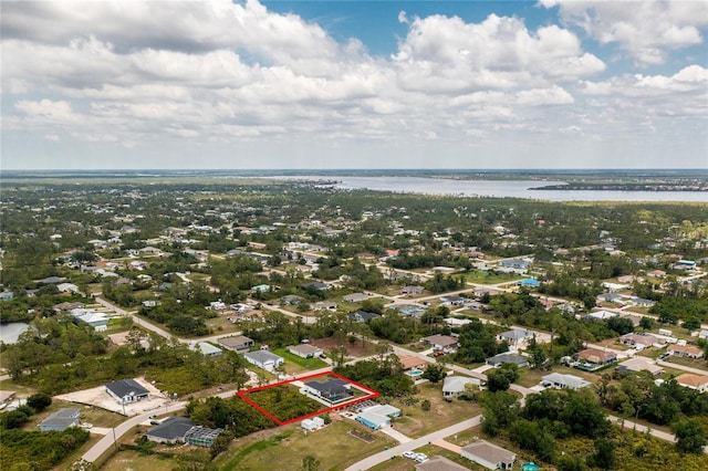 5532 Veracruz Ter, Port Charlotte, FL 33981 - aerial view of property and surrounding area with property boundaries highlighted and a large body of water