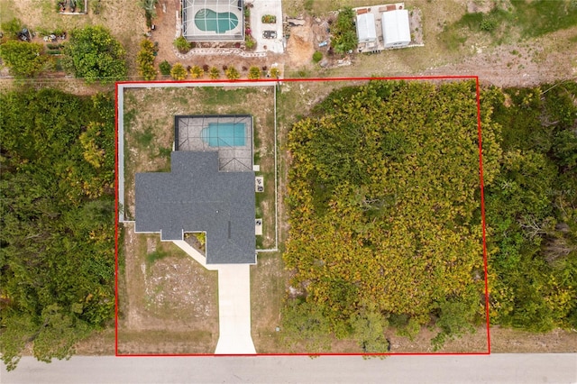 5532 Veracruz Ter, Port Charlotte, FL 33981 - aerial view of property and surrounding area with property boundaries highlighted and a pool area
