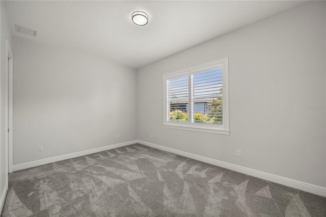 3302 Palm Dr, Punta Gorda, FL 33950 - carpeted spare room featuring baseboards
