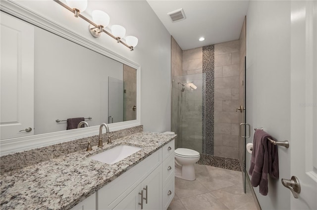 3302 Palm Dr, Punta Gorda, FL 33950 - full bathroom featuring toilet, vanity, a shower stall, recessed lighting, and tile patterned flooring