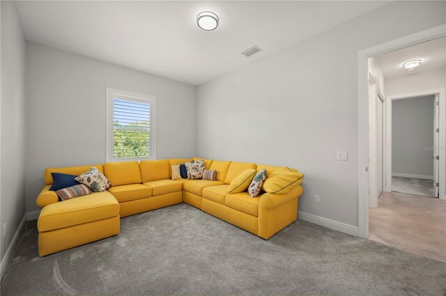 3302 Palm Dr, Punta Gorda, FL 33950 - carpeted living area with baseboards