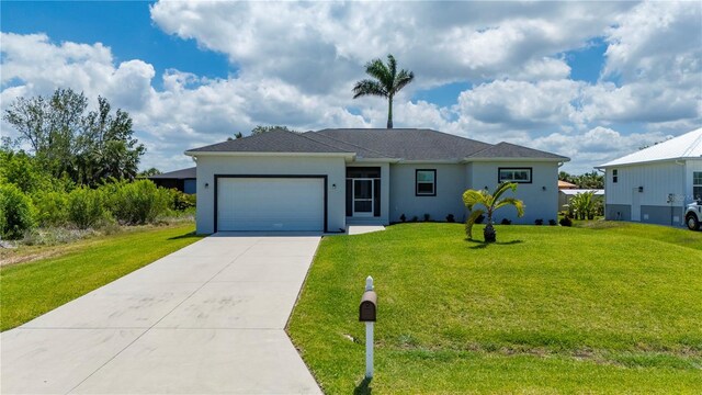 3302 Palm Dr, Punta Gorda, FL 33950 - ranch-style home featuring an attached garage, driveway, a front lawn, and stucco siding
