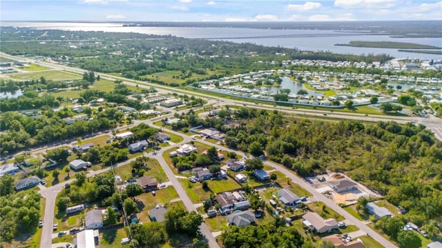 4702 Westwood Dr, Punta Gorda, FL 33982 - aerial view of property and surrounding area featuring a large body of water and nearby suburban area