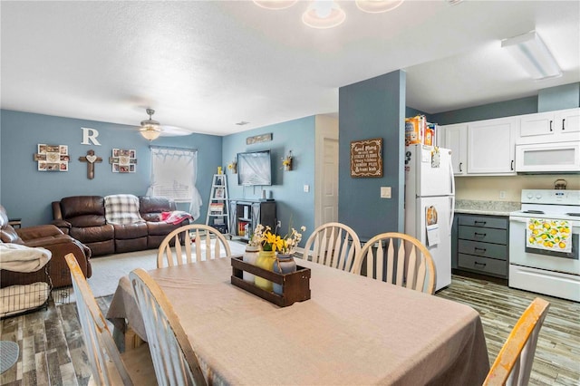 4702 Westwood Dr, Punta Gorda, FL 33982 - dining area with wood finished floors and a ceiling fan