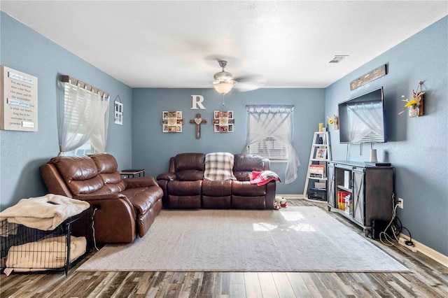 4702 Westwood Dr, Punta Gorda, FL 33982 - living room with wood finished floors, a ceiling fan, and baseboards