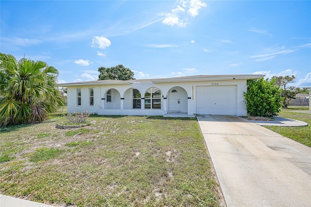 2166 Beacon Dr, Port Charlotte, FL 33952 - ranch-style home with an attached garage, concrete driveway, stucco siding, and a front yard