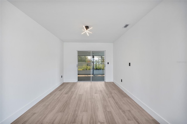2166 Beacon Dr, Port Charlotte, FL 33952 - spare room with light wood-type flooring and baseboards