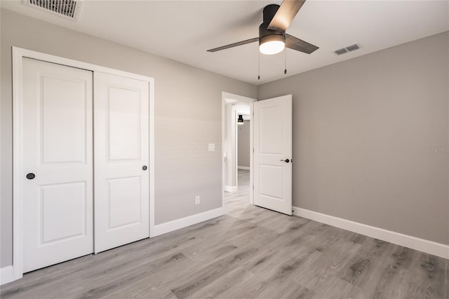 16280 Minorca Dr, Punta Gorda, FL 33955 - unfurnished bedroom featuring light wood-type flooring, baseboards, a closet, and ceiling fan
