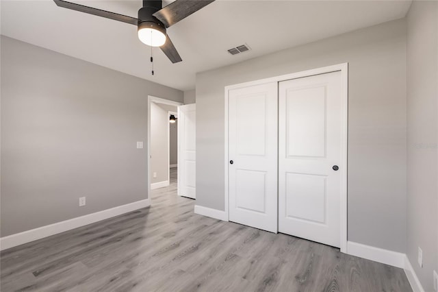 16280 Minorca Dr, Punta Gorda, FL 33955 - unfurnished bedroom featuring light wood-type flooring, a closet, baseboards, and ceiling fan