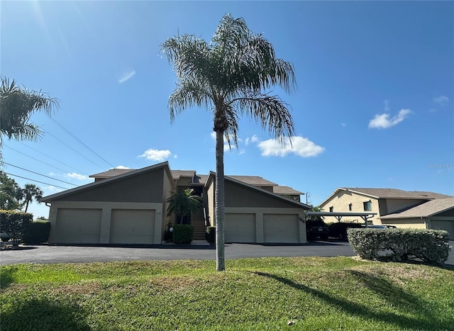 4120 SE 19th Pl Unit 202, Cape Coral, FL 33904 - view of front of property with a front lawn and stucco siding