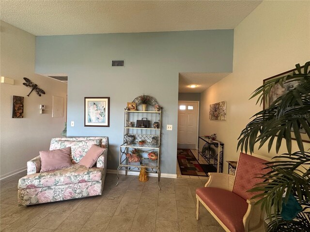 4120 SE 19th Pl Unit 202, Cape Coral, FL 33904 - living room featuring baseboards and high vaulted ceiling