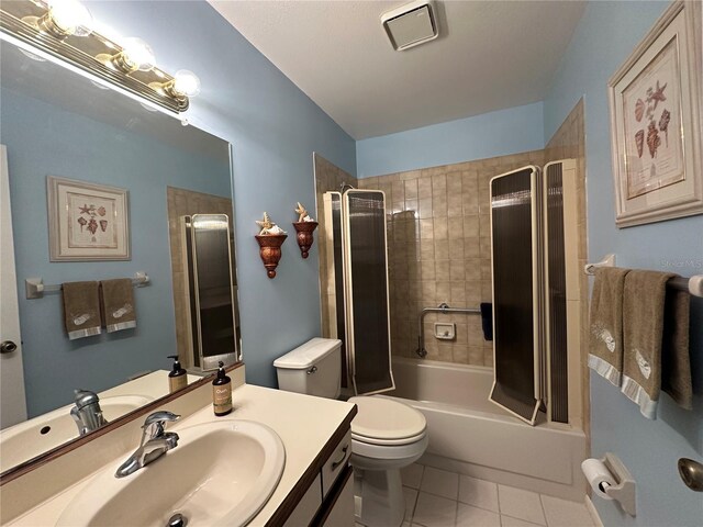 4120 SE 19th Pl Unit 202, Cape Coral, FL 33904 - full bathroom with tile patterned floors, vanity, toilet, and  shower combination