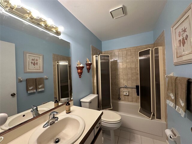 4120 SE 19th Pl Unit 202, Cape Coral, FL 33904 - bathroom with tile patterned flooring, vanity, bathtub / shower combination, and toilet