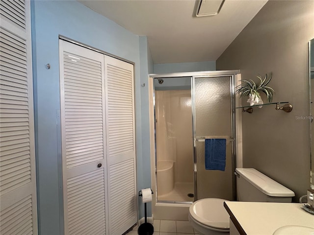 4120 SE 19th Pl Unit 202, Cape Coral, FL 33904 - bathroom with a closet, toilet, a stall shower, and vanity