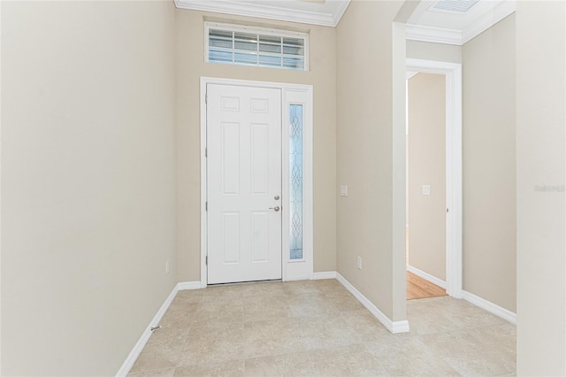 11666 Parrotfish St, Venice, FL 34292 - entrance foyer with crown molding, baseboards, and light tile patterned flooring