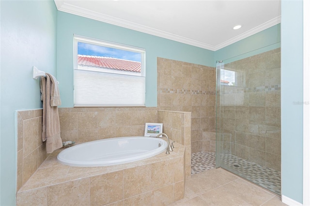 11666 Parrotfish St, Venice, FL 34292 - full bathroom featuring a garden tub, walk in shower, crown molding, and tile patterned flooring