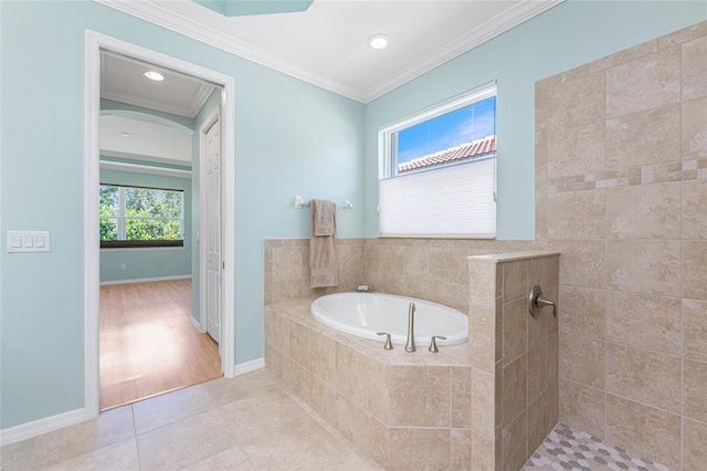 11666 Parrotfish St, Venice, FL 34292 - full bath featuring ornamental molding, a bath, tile patterned flooring, baseboards, and recessed lighting