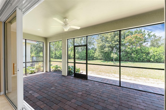 11666 Parrotfish St, Venice, FL 34292 - unfurnished sunroom with ceiling fan and plenty of natural light