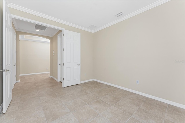 11666 Parrotfish St, Venice, FL 34292 - unfurnished room featuring ornamental molding, baseboards, and arched walkways
