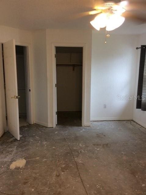 23220 Rountree Ave, Port Charlotte, FL 33980 - unfurnished bedroom with a ceiling fan and a closet