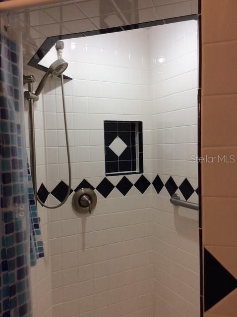 23220 Rountree Ave, Port Charlotte, FL 33980 - bathroom view of a tile shower