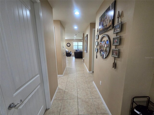 2739 Sherman Oak Dr, North Port, FL 34289 - corridor with light tile patterned floors, recessed lighting, and baseboards